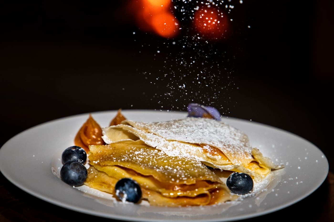 Crêpes aux myrtilles et sucre glace